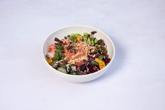 Loch Duart salmon and chipotle, pickled cabbage, hijiki, edamame, pickled cucumber, fresh cucumber, mustard greens and furikake seasoning. 1 serving.