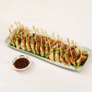 Let us take the hassle out of your canape party by providing you with a delicious  gyoza selection containing 30 pieces of gyoza. Perfect for 10 to 12 people. Comes with Chinese black vinegar, crispy chilli oil dressing and skewers. 30 pieces