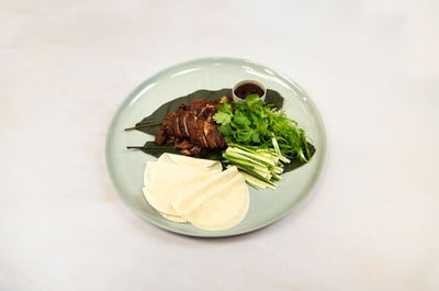 Crispy aromatic duck, scallions, cucumber, hoi sin sauce and pancakes. Half Duck.