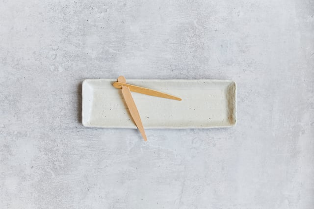 Eating with chopsticks isn't easy even with big hands!