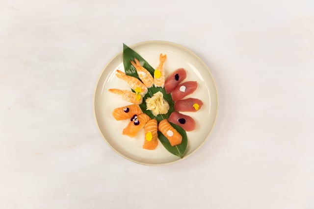 Nigiri platter containing: Salmon Nigiri (4 pieces), Tuna Nigiri (4 pieces), and Ebi Nigiri (4 pieces).