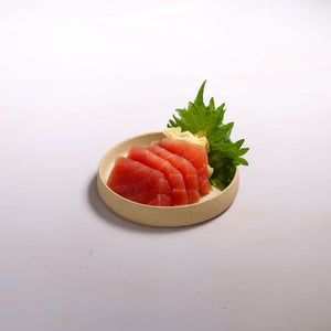 Yellowfin tuna sashimi served with natural pickled ginger, soy sauce and wasabi. 4 pieces.