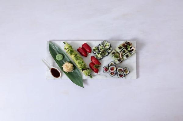 Sushi selection for vegans. Contains the following: Vegan Dragon Roll (8 pieces), Super Greens Ura Maki (8 pieces), House Pickles Hoso Maki (8 pieces), Cucumber Maki (8 pieces) and Piquillo Pepper Nigiri (2 pieces).