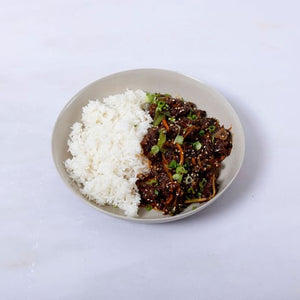 Wok fried flank steak, shaoxing wine, garlic, ginger and chilli. Served with steamed jasmine rice. 1 serving.